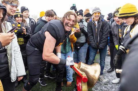 Blake Kaufman ‘23 rings the Monon Bell.